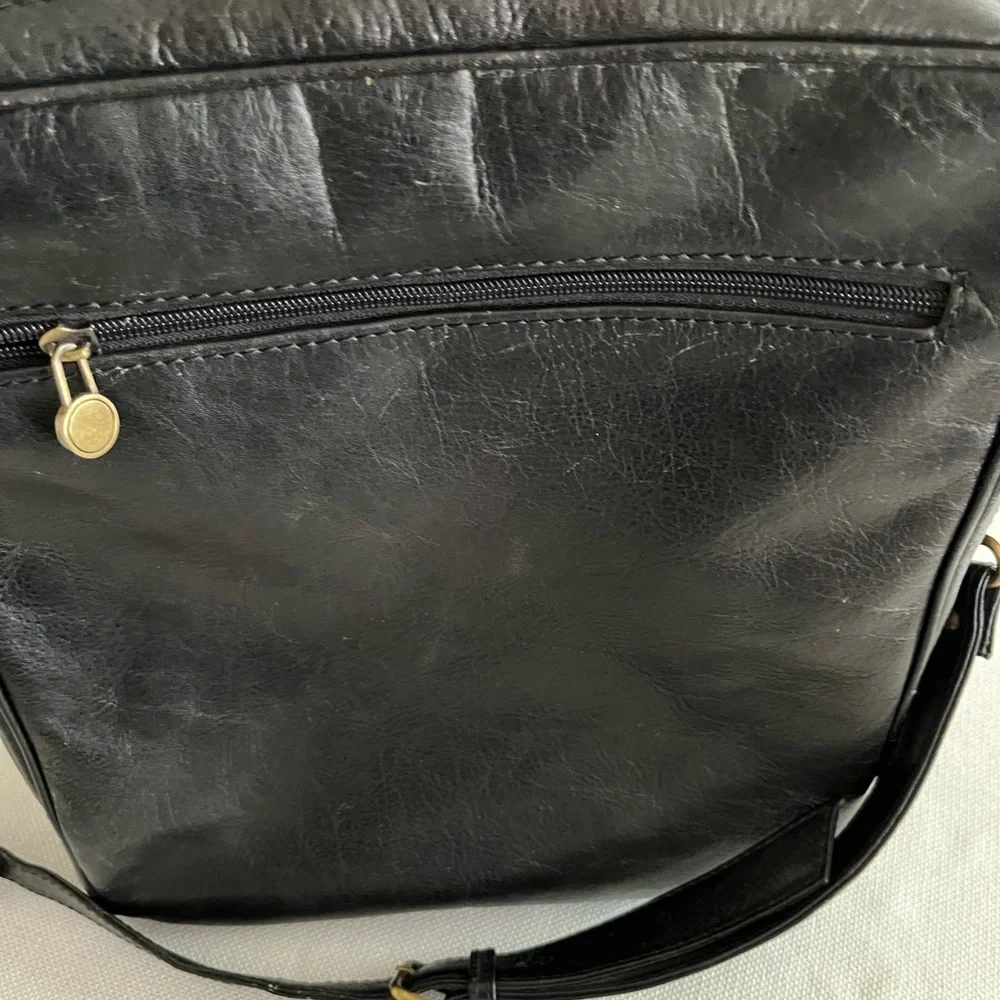 Vintage 70’s Luciano black Italian leather messenger bag.